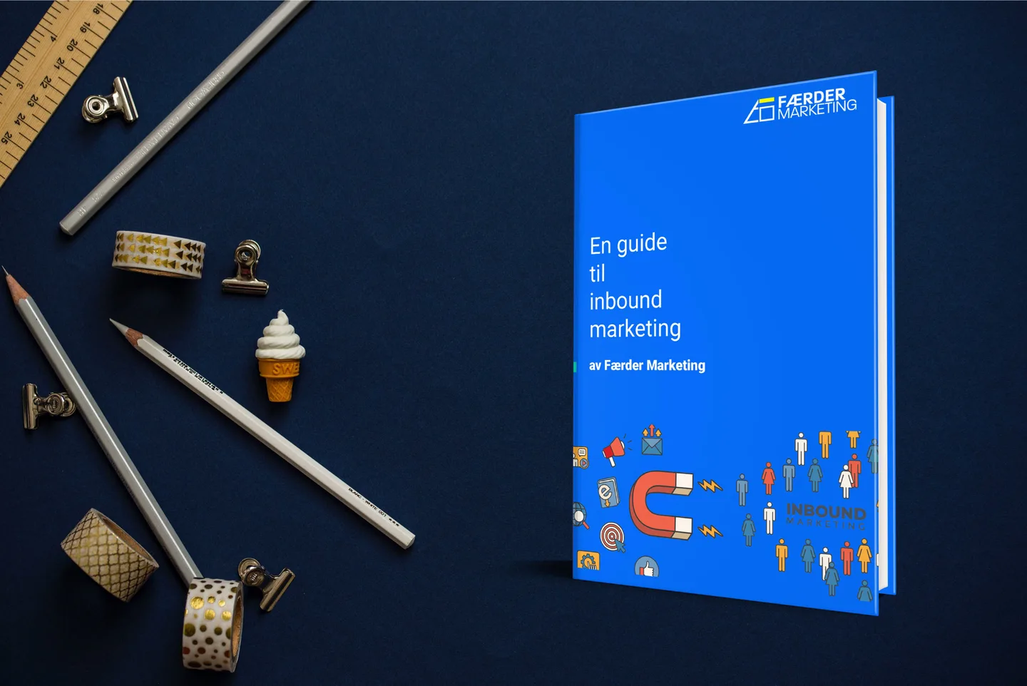 A book and office supplies illustrating downloadable guides.