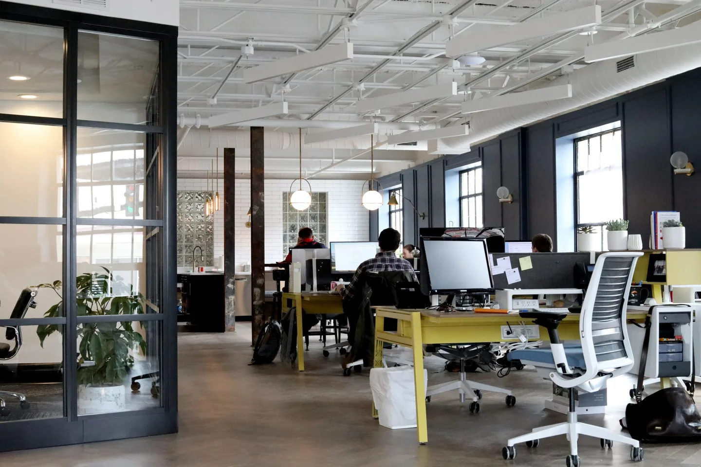 An open-plan office with workstations.